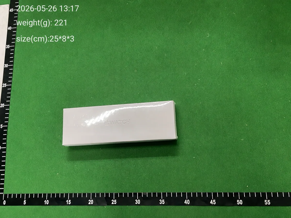 QC inspection photo of a packaged smartwatch beside measurement scales with weight and size details