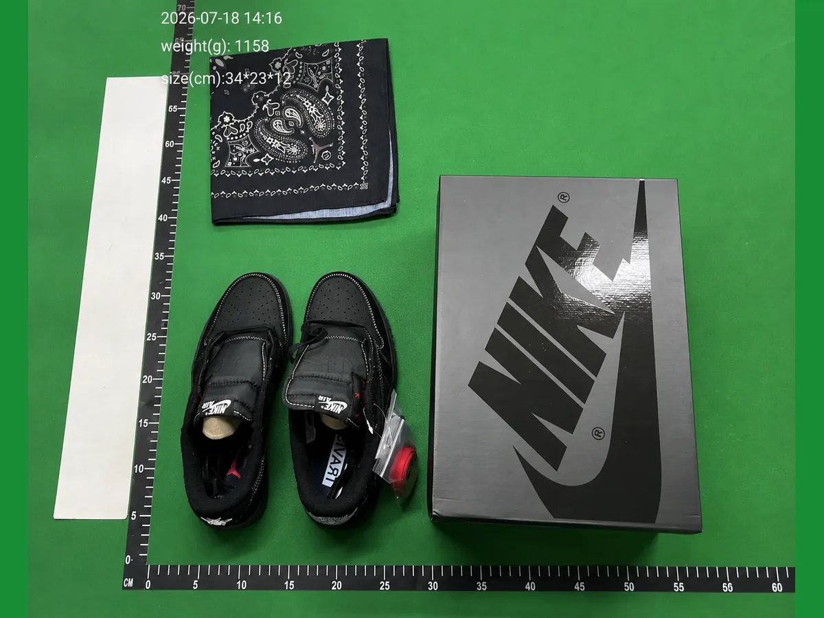 QC inspection photo of black footwear, packaging and accessories beside measurement scales